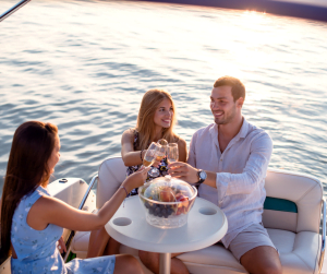 Friends drinking on boat