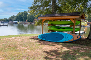 kayaks and paddleboard at lake escape vacation rental