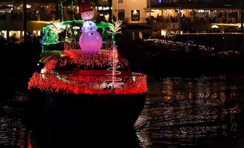 boat decorated with lights for a christmas boat parade