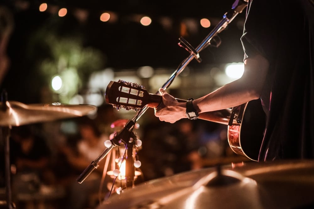 musicians playing concert on stage
